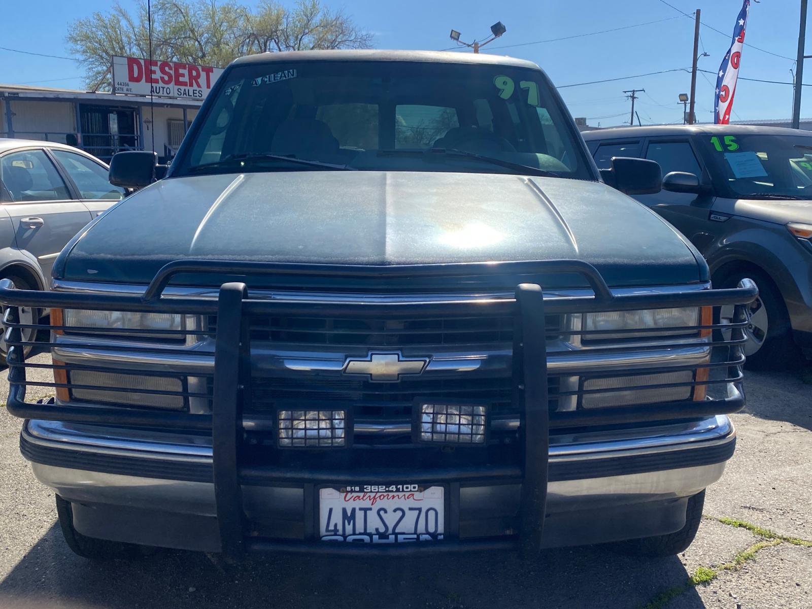 1996 Chevrolet Suburban C1500 2WD (1GNEC16R4TJ) with an 5.7L V8 OHV 16V engine, 4-Speed Automatic Overdrive transmission, located at 44356 Date Ave., Lancaster, CA, 93534, (661) 945-6555, 34.688919, -118.139374 - Photo #0